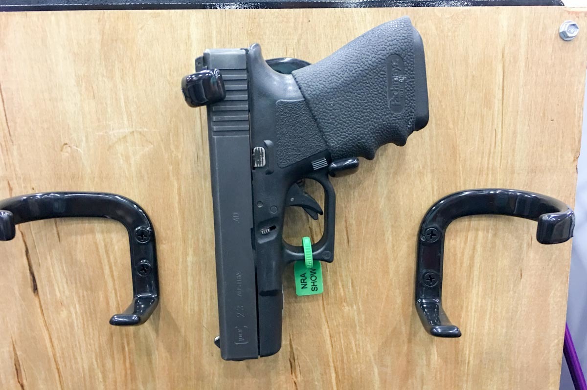 Simplistic but clever. Vertical Gun Racks makes supports for handguns and long guns.