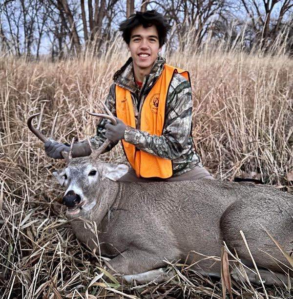 Kid with first buck Montana