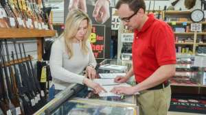 Customer Shopping in retail store fiearms by NSSF e991f65cda8cad0d03a7ea8cd2674507 200224 082505