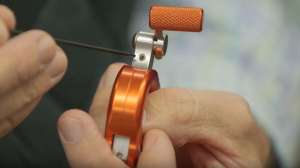 Harvester bow release adjustment