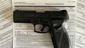 NICS Forms with pistol