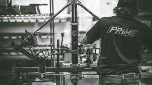 Cropped Prime Archery factory employee working on a new bow courtesy image