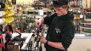 Resize SGS112 Rocky Mountain Discount Sports pro shop tech working on bow copyright Mark Kayser