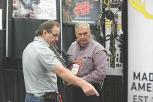 Buyer looking at bow at ATA