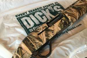 Dicks Sporting Goods with shotgun