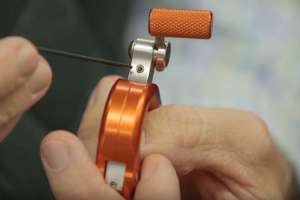 Harvester bow release adjustment