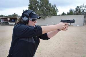 Mossberg MC1sc Hilary Dyer at range