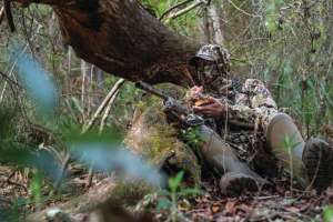 Turkey and deer hunters out in the woods or grass can benefit from treated apparel Photo by Oliver Rogers