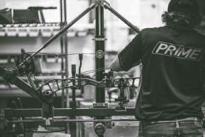 Cropped Prime Archery factory employee working on a new bow courtesy image