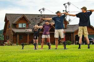 Hunters shooting in line