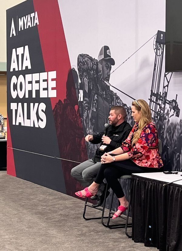 Web Michelle and Trent Marsh at ATA Show giving seminar e991f65cda8cad0d03a7ea8cd2674507